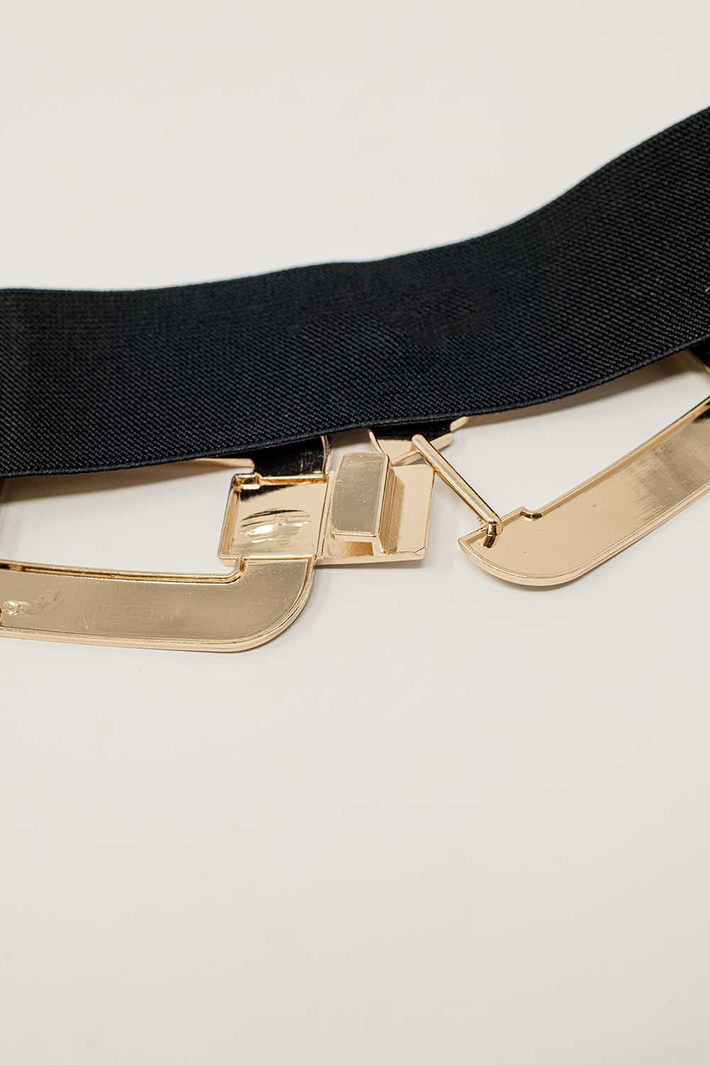 Cintura elastica nera con doppia fibbia ovale con incastonature di strass