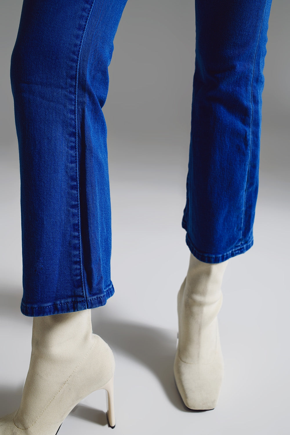Jeans a vita alta a zampa in blu