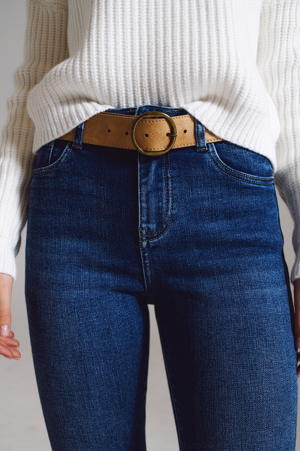jeans a zampa con bordo decorato