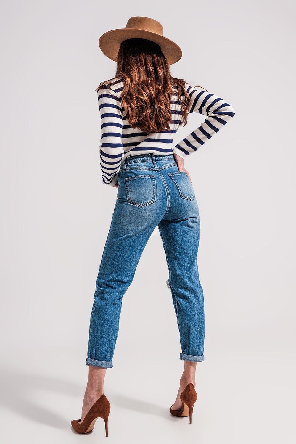 Jeans blu medio con abbottonatura asimmetrica