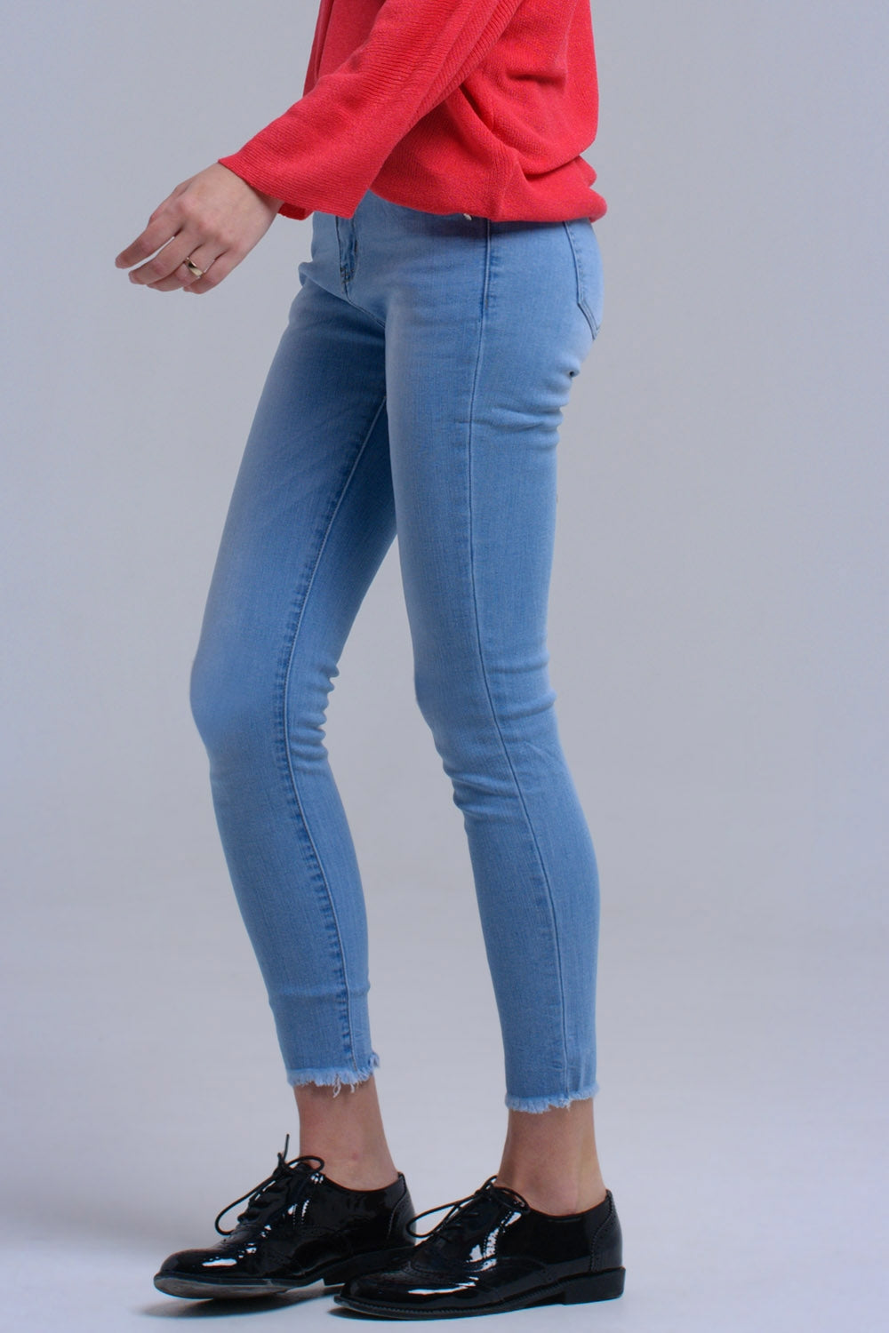 Jeans skinny azzurri con frange