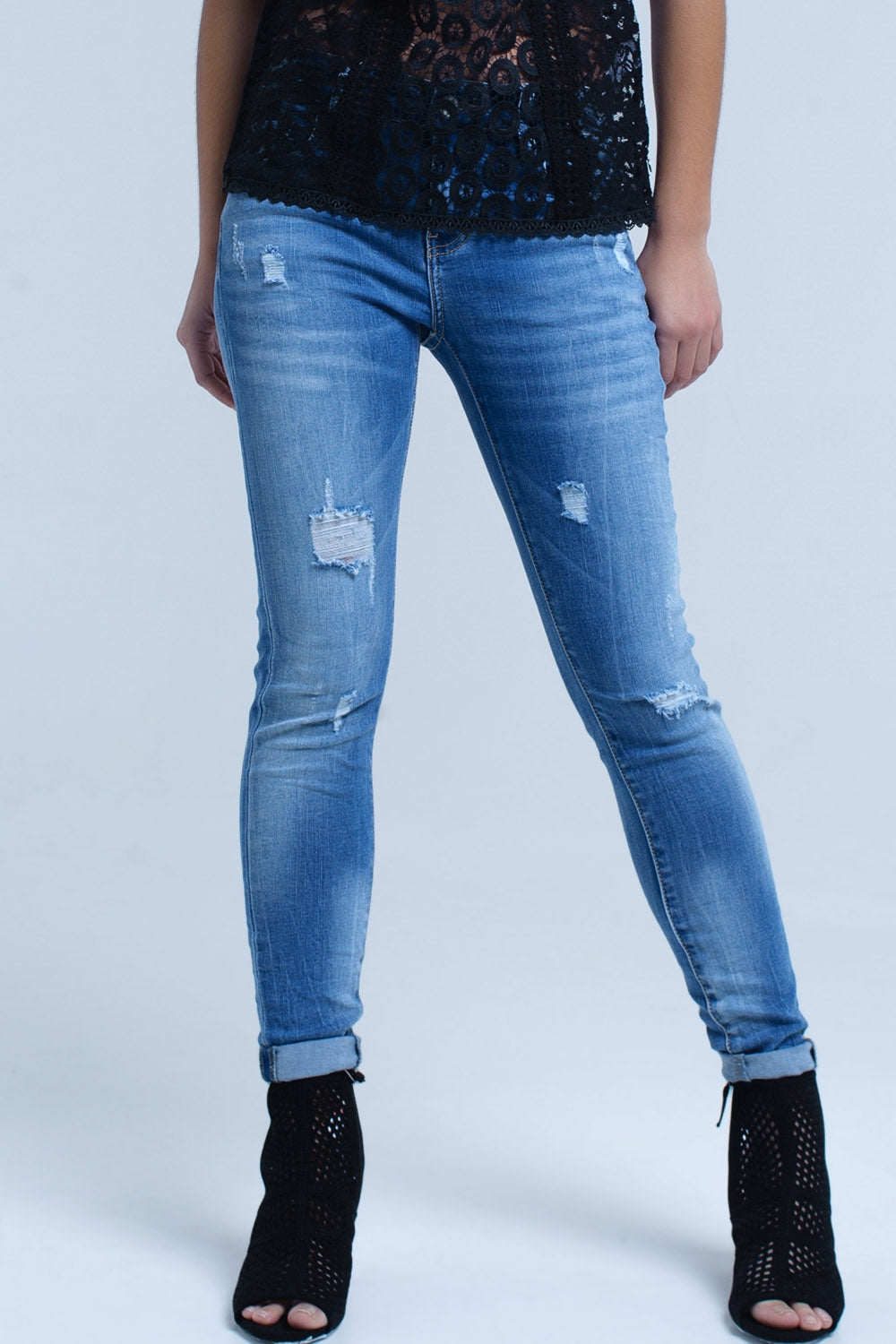 Jeans skinny con strappi