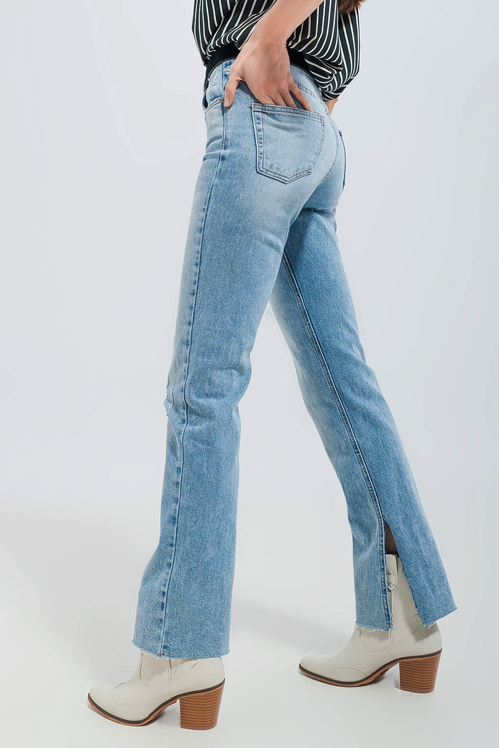 Jeans stretch lavaggio chiaro con fondo grezzo