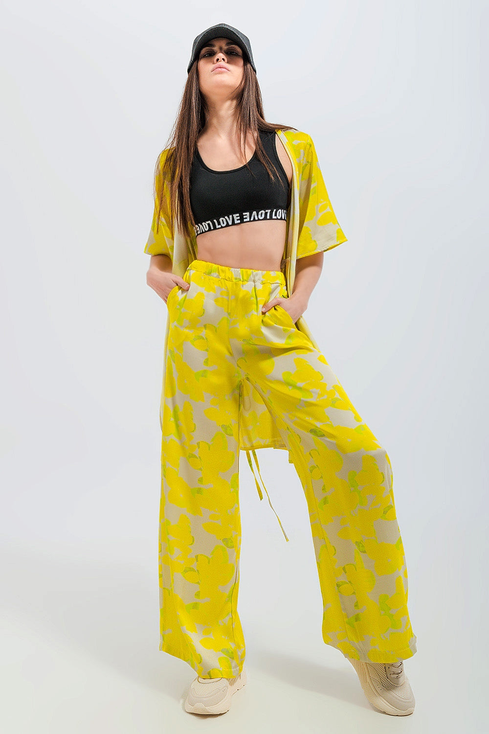 Q2 Pantaloni con fondo ampio in giallo a fiori