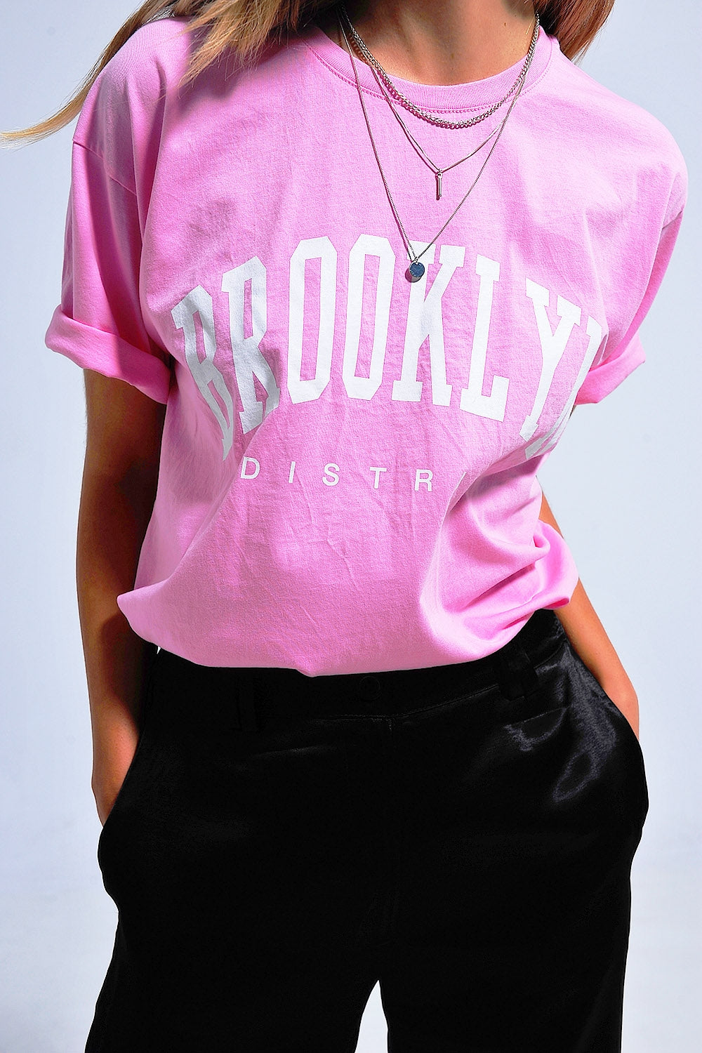 T shirt rosa con scritta Brooklyn